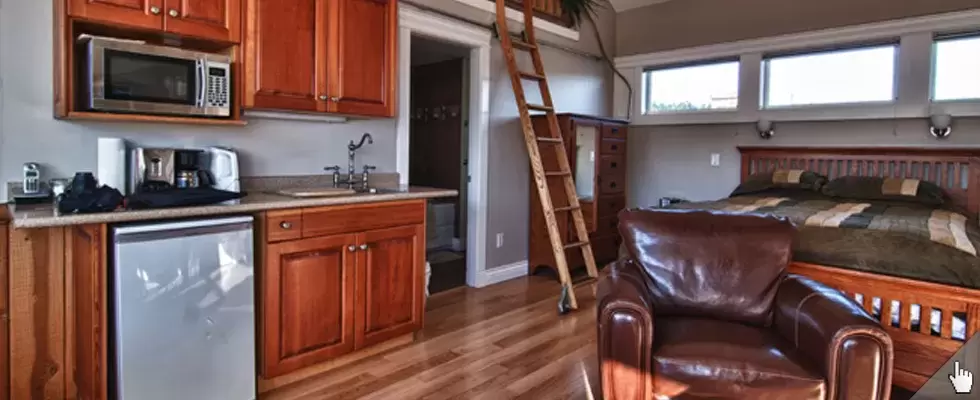 Luxury B&B bedroom suite with kitchenette and loft